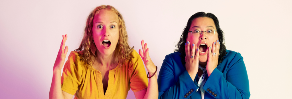 two excited artists with mouths open gasping at the camera