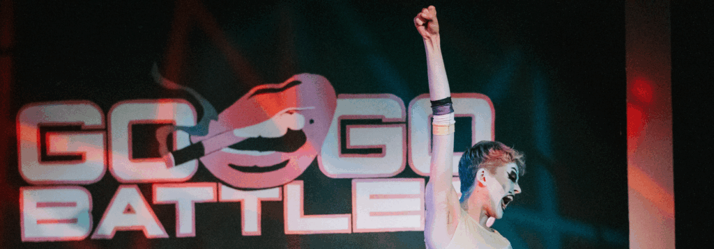 performer cheering on stage